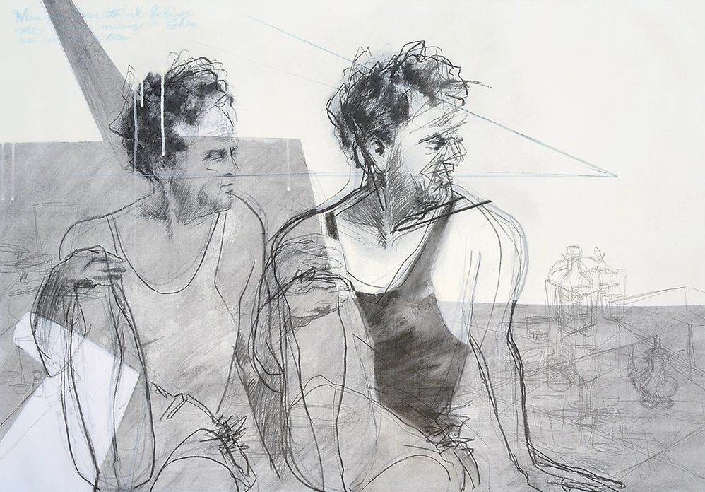 two men seated on a boat