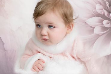 6 month old baby using AI to create a beautiful background that is floral