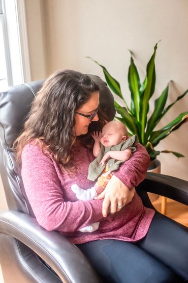 In Home newborn session with new baby girl and Mom only