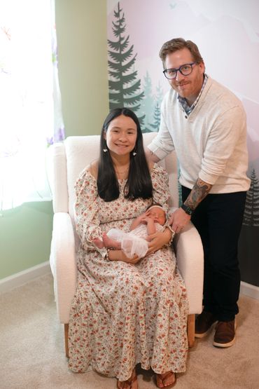 In Home Newborn session with Mom and dad in babies new room