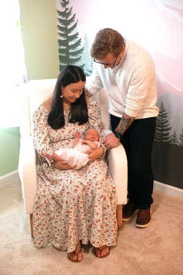 In Home Newborn session with Mom and dad in babies new room