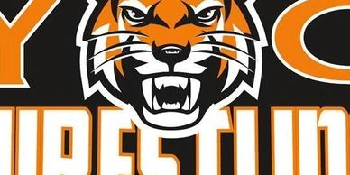 Fierce tiger mascot with wrestling text.