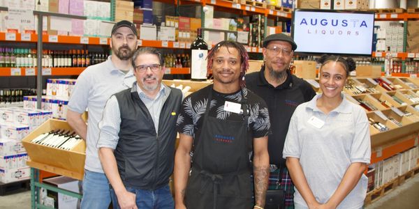 Our crew at Augusta Liquors, ready to assist in any way possible!