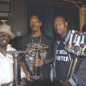 ESPN GM King of Bling Celebrity Car Show Car Parts Trophies for Cedric, Snoop Dogg and Dwayne Wade.