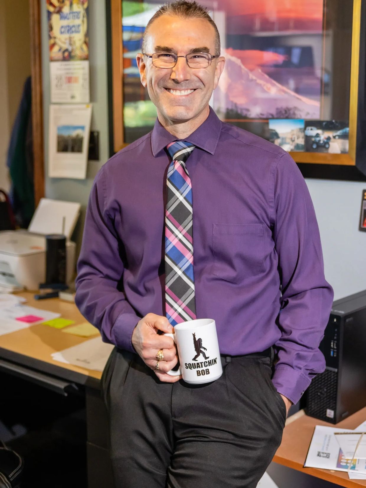 Closeup headshot of a man smiling