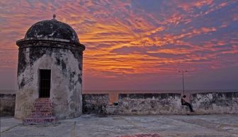 Sunset in Cartagena de Indias, over the old town wall, dungeon. Incentives in Cartagena