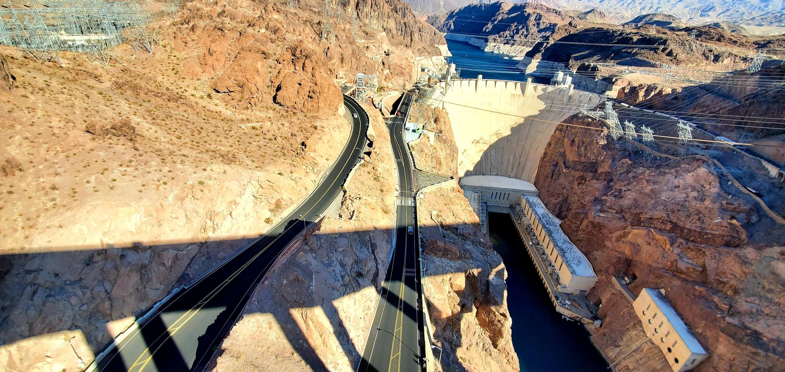 looking at the hoover dam from the bridge