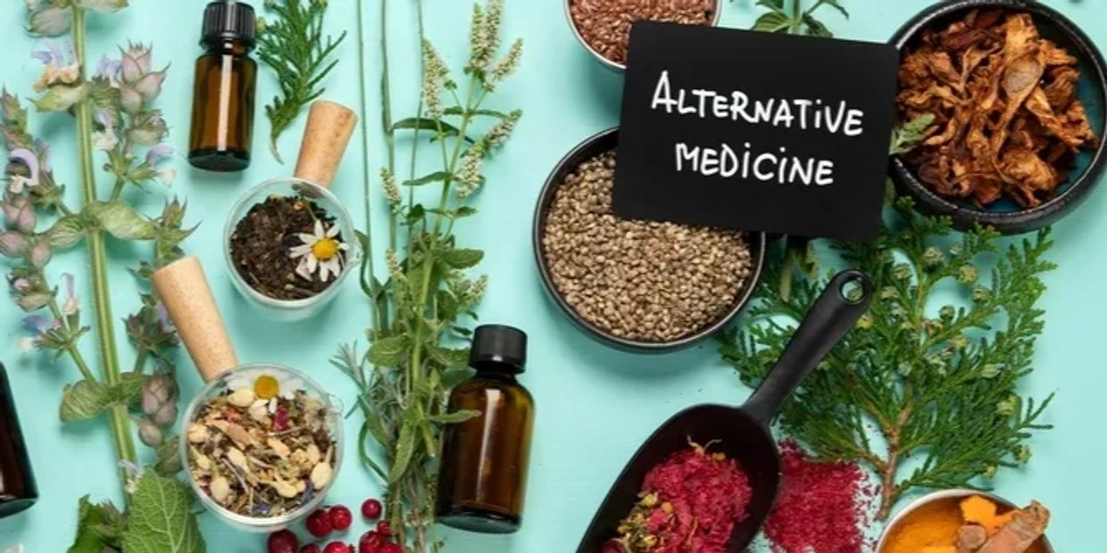 Various herbs, seeds, and essential oils labeled as alternative medicine.