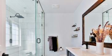 Bathroom Remodel with double vanity, soaking tub and walk in shower with glass