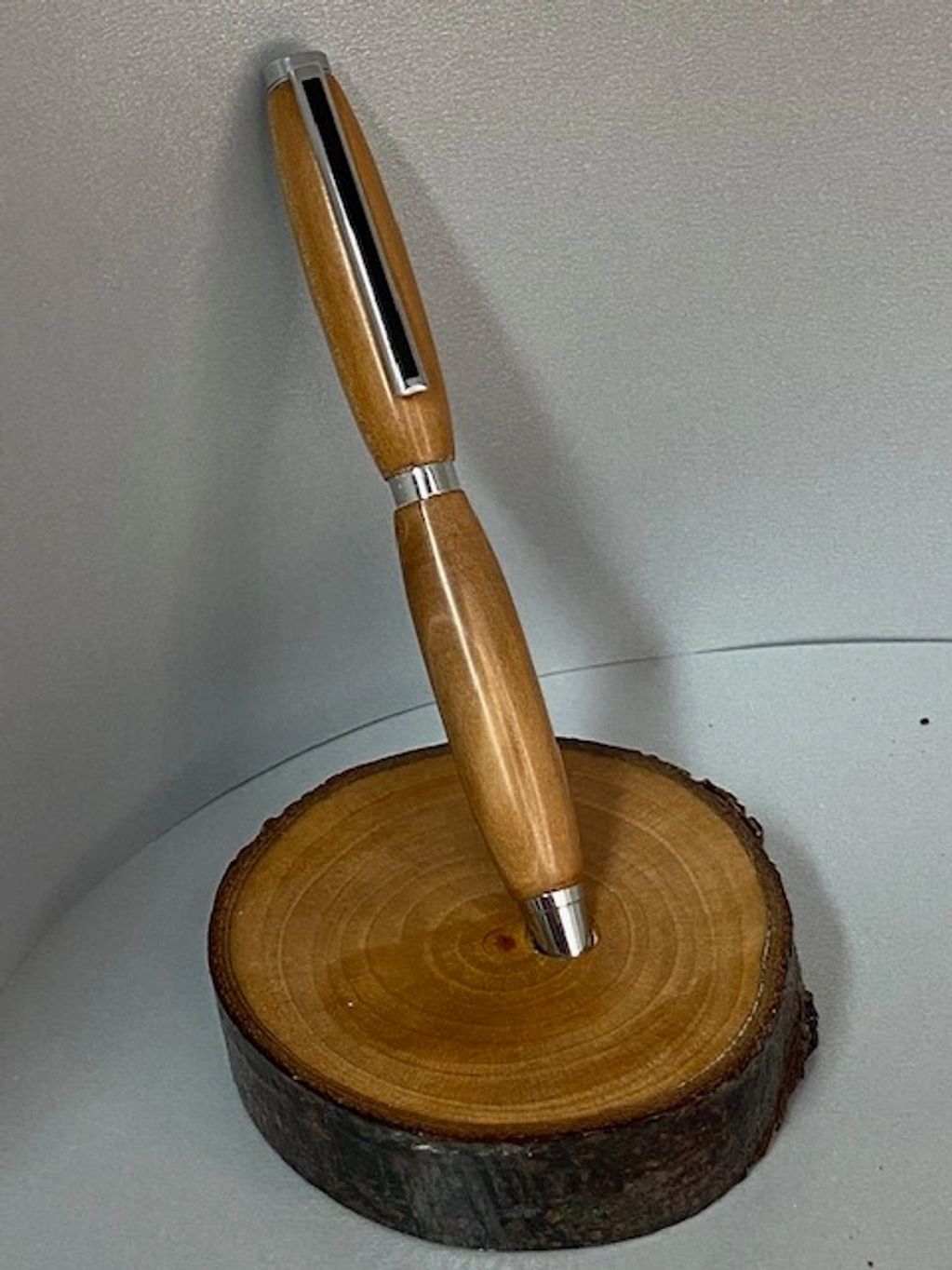 This pen was made from a tree branch from the owners property. The tree had sentimental value and ha