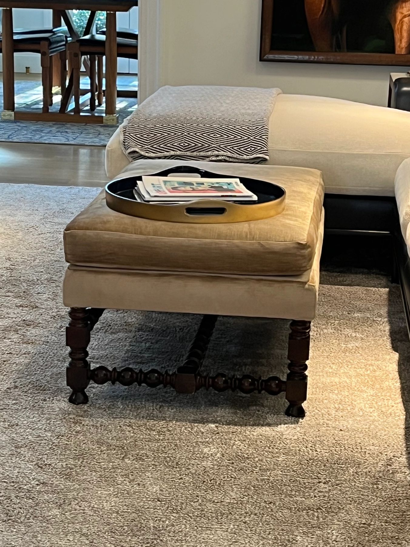 Tan upholstered ottoman