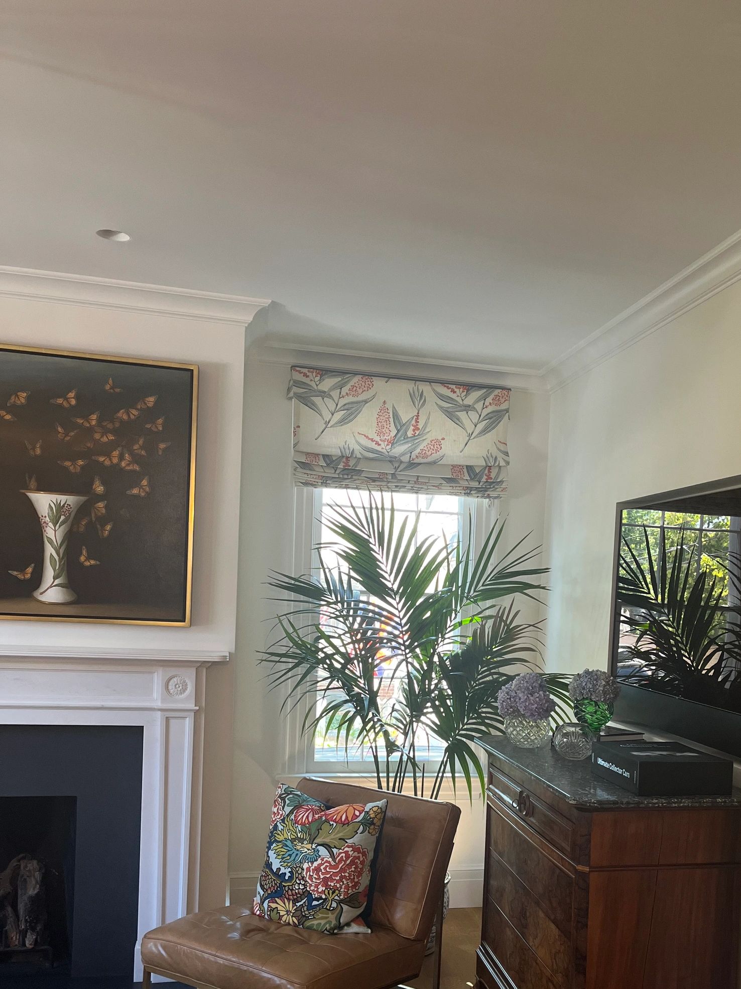 Roman shade with floral pattern