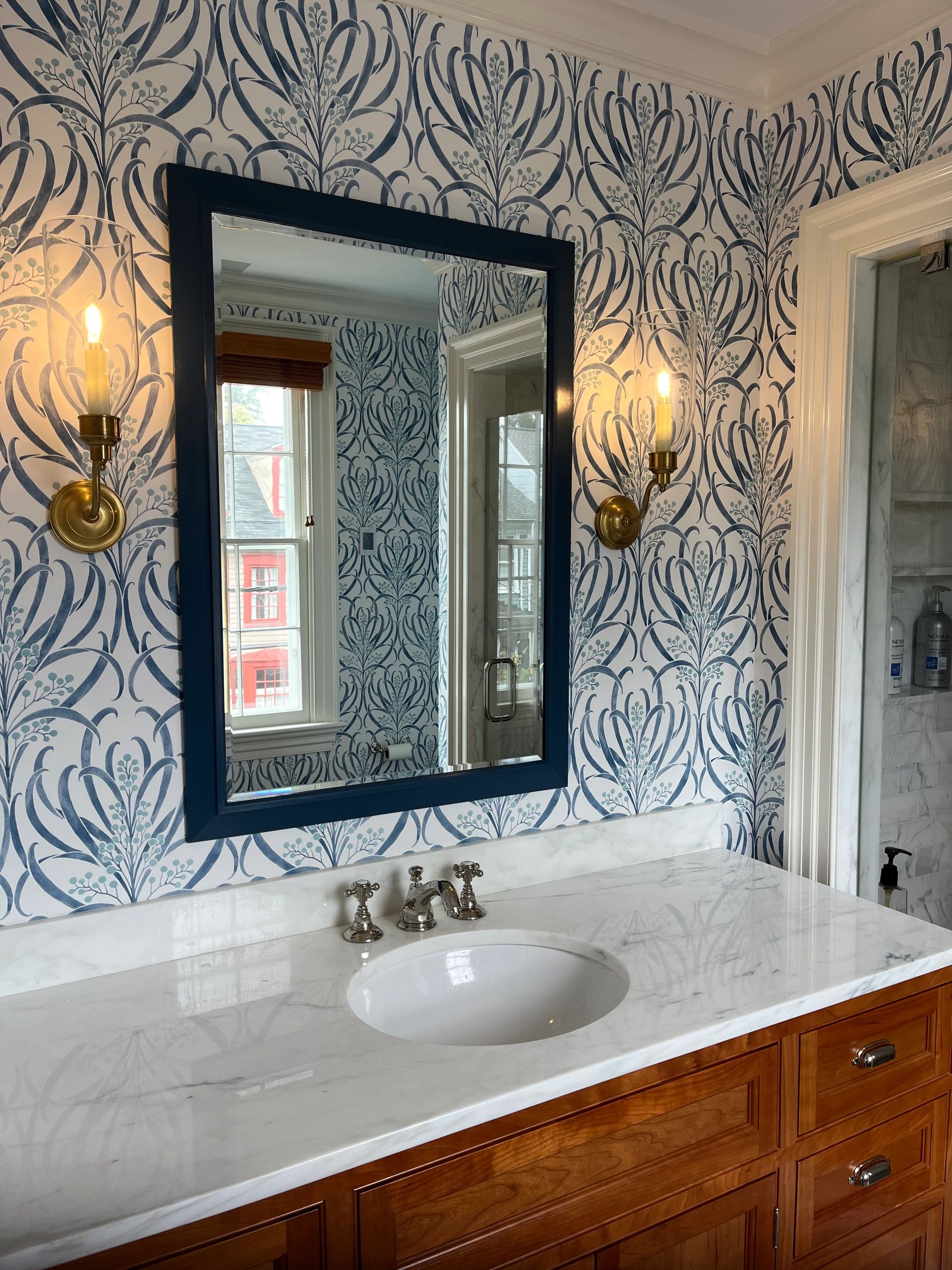 Bathroom wallpaper and sconces