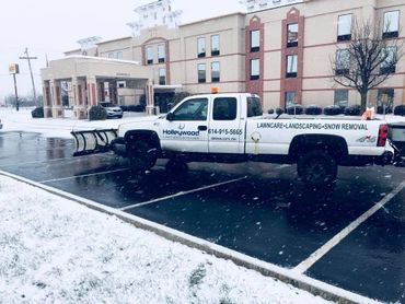 Snow plowing Comfort INN and Suites Grove City Ohio