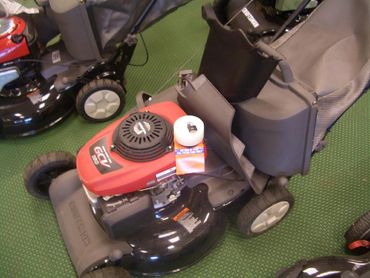 A lawn mower's oil cap lock