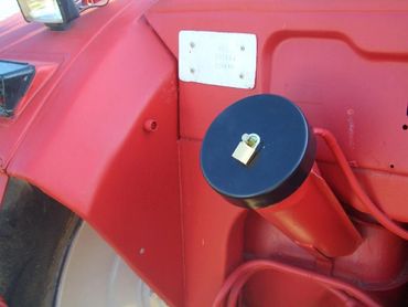 A black oil cap lock