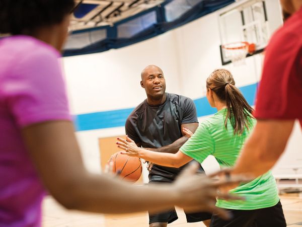 ymca photo of adults playing basketball