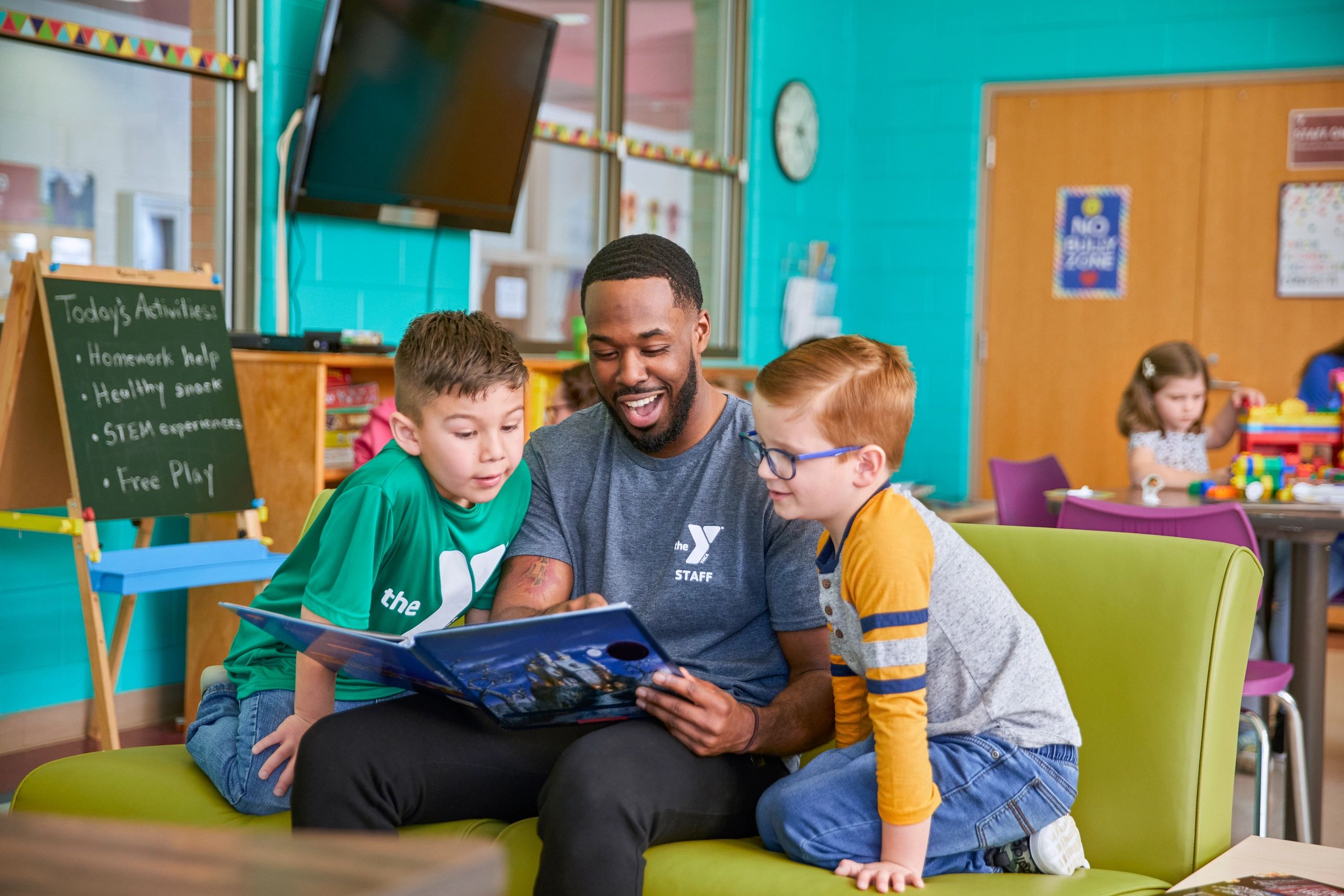 kids reading at YMCA after school program