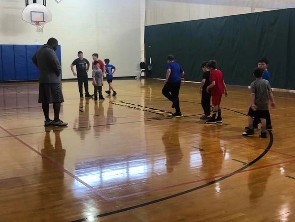 kids playing basketball at limestone family ymca gym