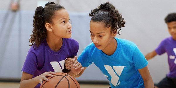 kids playing basketball at YMCA gym
