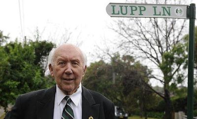 Jack Lupp at the street sign in Lane Cove NSW named after him (Lupp Lane) 2013
