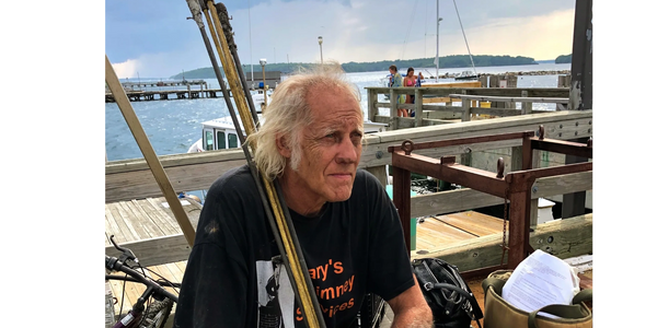 Our patriarch Gary waiting at the Long Island Maine docks after a hard day of chimney sweeping.