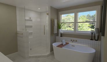 Modern bathroom with a freestanding tub and glass shower enclosure.