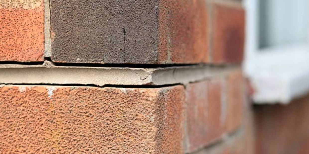 cracks in brick veneer house
