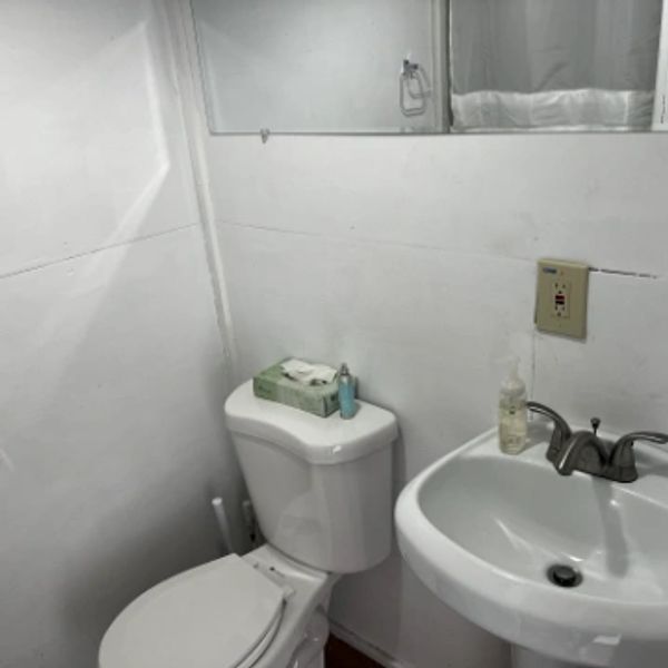 Two, separate, external bathroom showers. Located across the driveway.