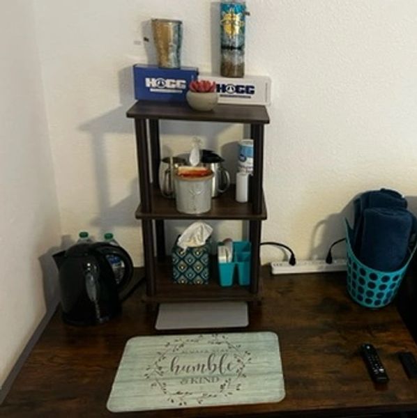 Hot and cold drinks, K cup coffee maker, microwave, refrigerator, first aid kit, salt and pepper, su