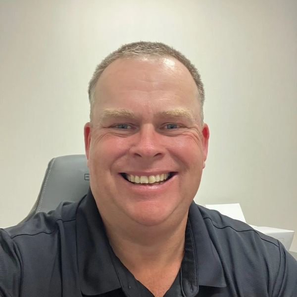 Headshot of Brett Carter, President and Founder of 22 Financial Services LLC.