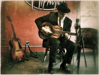 blues slide guitar
cool man playing guitar