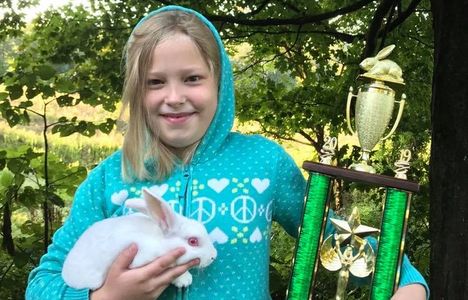 Madison with Best in Show Mini Rex buck