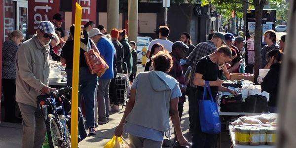 The purpose isn’t just to hand out food; it’s about building trust, and spending time with community