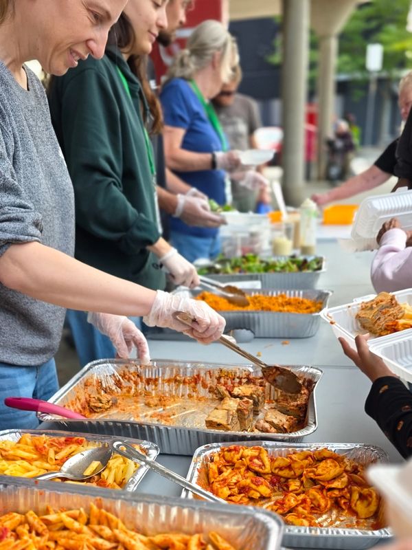 Food for Now Etobicoke.  Friday Night Outreach.  Serving people on the sidewalk.  Lakeshore village.