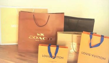 The branded hamper filled with Louis Vuitton ,Coach, Burberry was prepared for 50th Birthday Hamper.