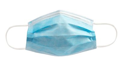 A picture of a surgical mask that is required upon entry into the building