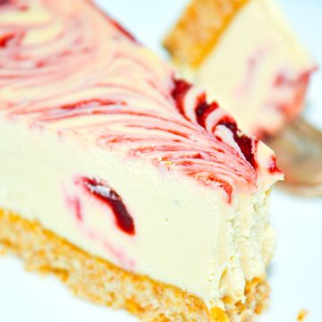 Vanilla Cheesecake with Dark Cherry Amaretto Sauce