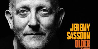 Black and white portrait of Jeremy Sassoon with bold text.