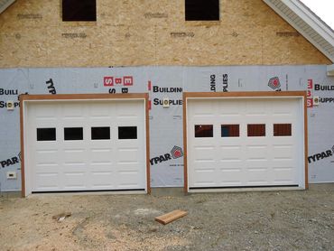 two 9 x 7 garage doors installed in Belfast Maine