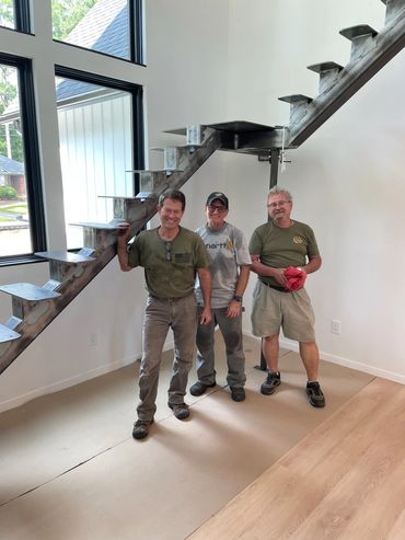 The CaroKen team after a successful staircase installation.