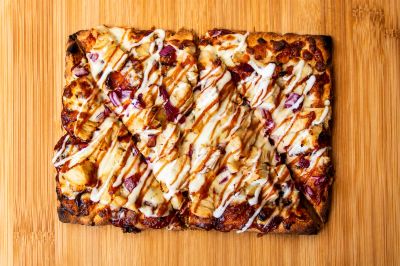 Photo of a BBQ chicken pizza
