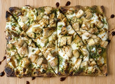 Photo of a pesto chicken pizza