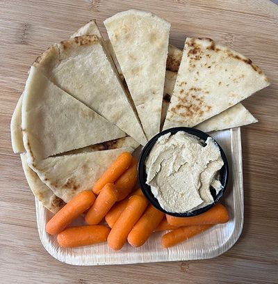 Naan, carrots, hummus plate