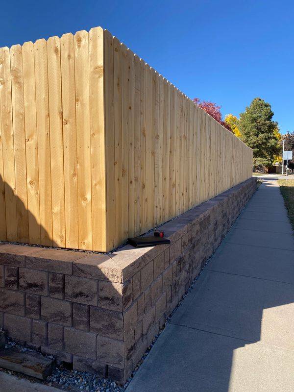 Retaining wall and fence
