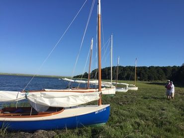 NSA Cat boats on the Wequassett Beach on Pleasant Bay Cape Cod
