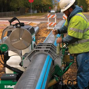 This operator is welding HDPE pipe with a McElroy TracStar 618 fusion machine during training.