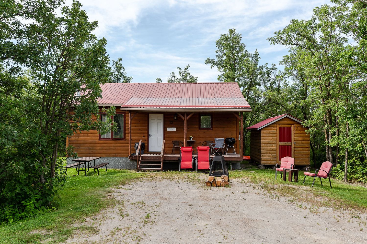 Log cabin surrounded by trees