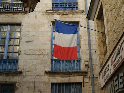 "French flag and building in france"