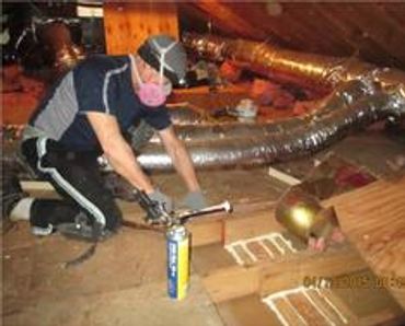 Spray foam is used to seal wall top plates.